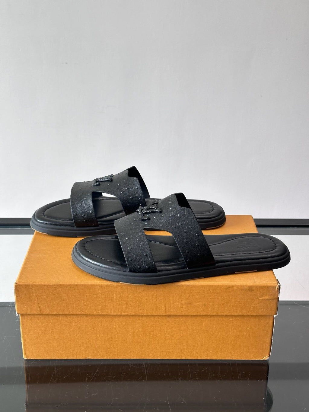 Louis Vuitton Black Embossed Slide Sandals — side