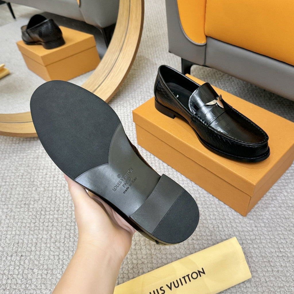 Louis Vuitton Black Embossed Leather Loafers — detail