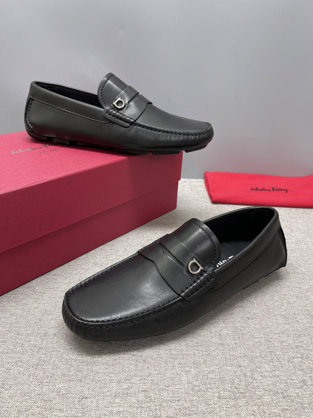 Ferragamo Black Buckle Loafers — model