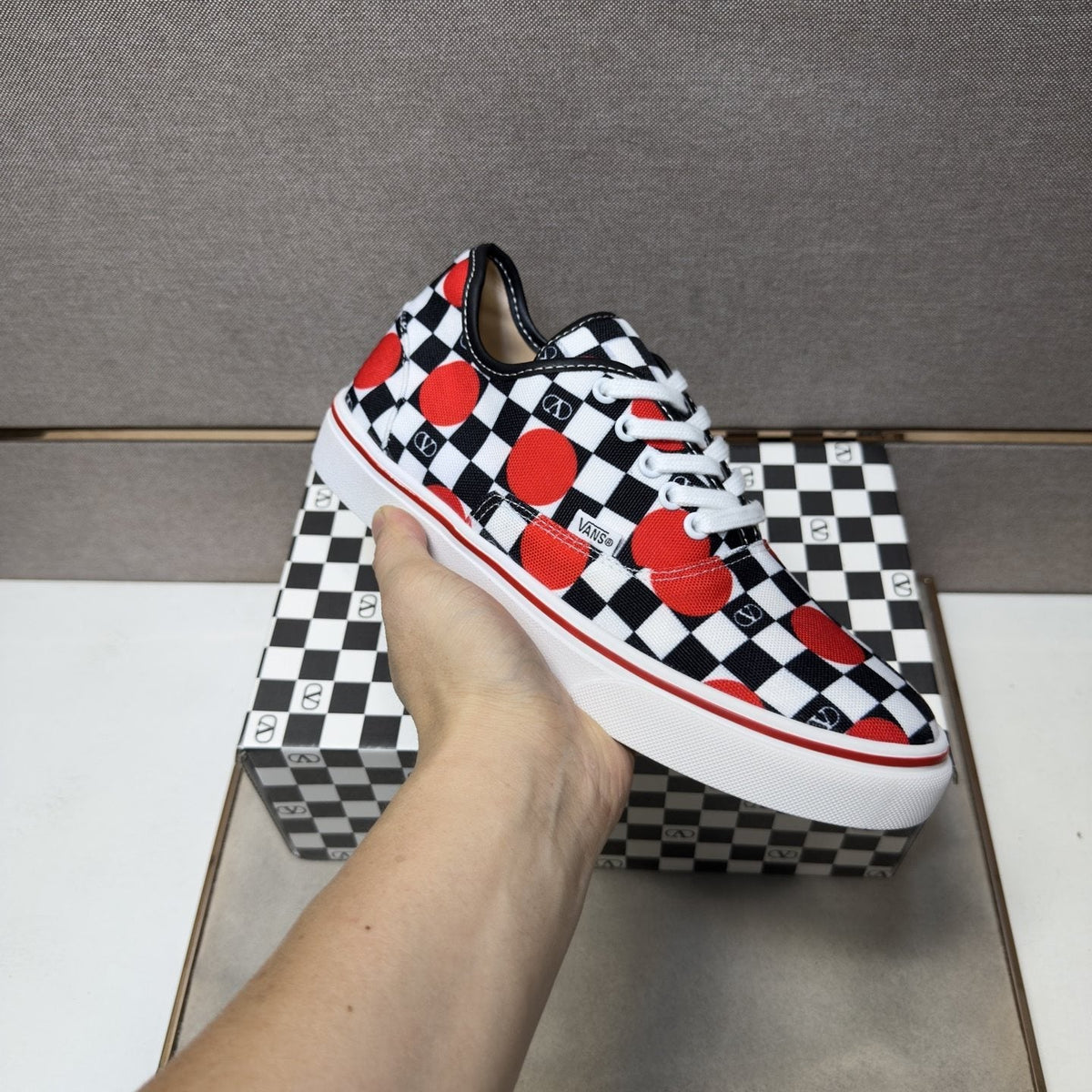 Vans Checkerboard Red Accent Sneakers — model