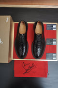 Christian Louboutin Black Embossed Lace-Up Dress Shoes — front