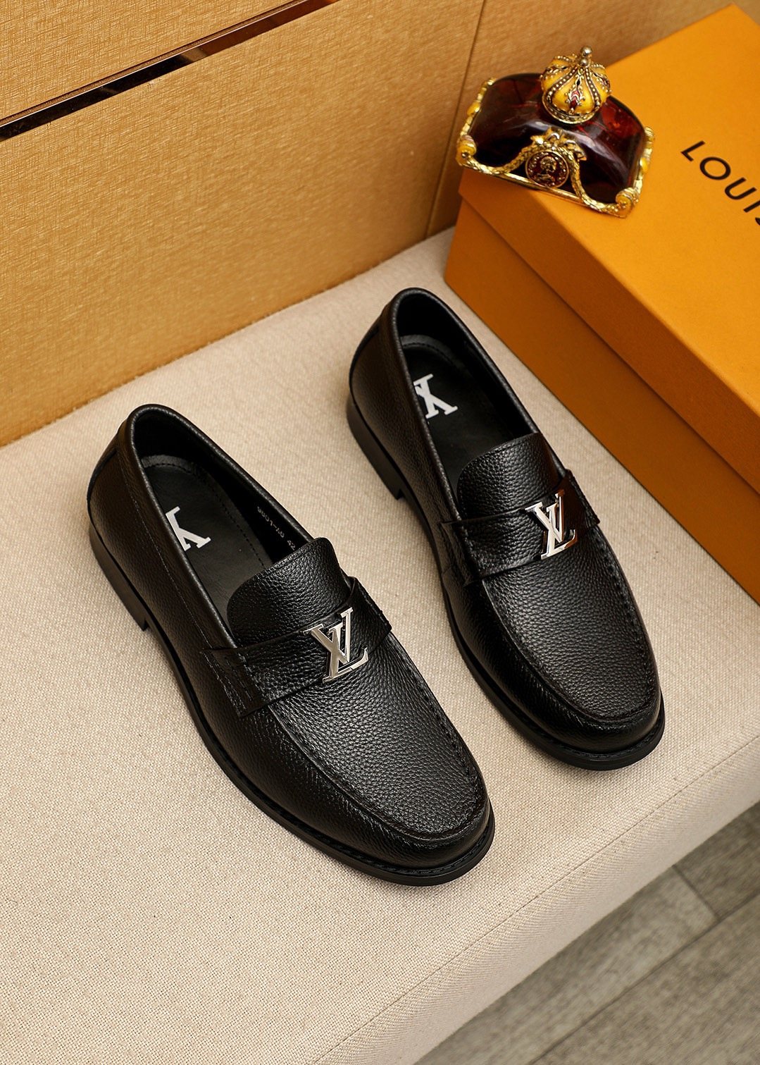 Louis Vuitton Black Pebbled Loafers — front