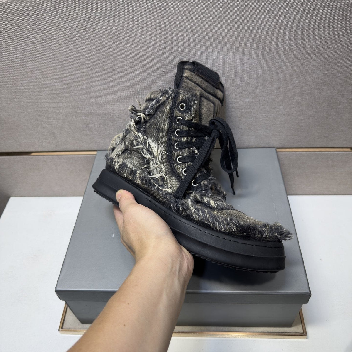 Gray and Black Distressed High-Top Sneakers — front