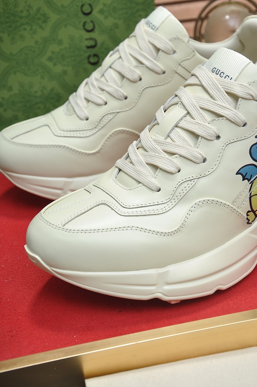 Gucci Dinosaur Graphic Sneakers — detail