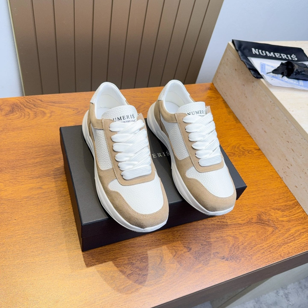 Numeris Paneled Low-Top Sneakers — front