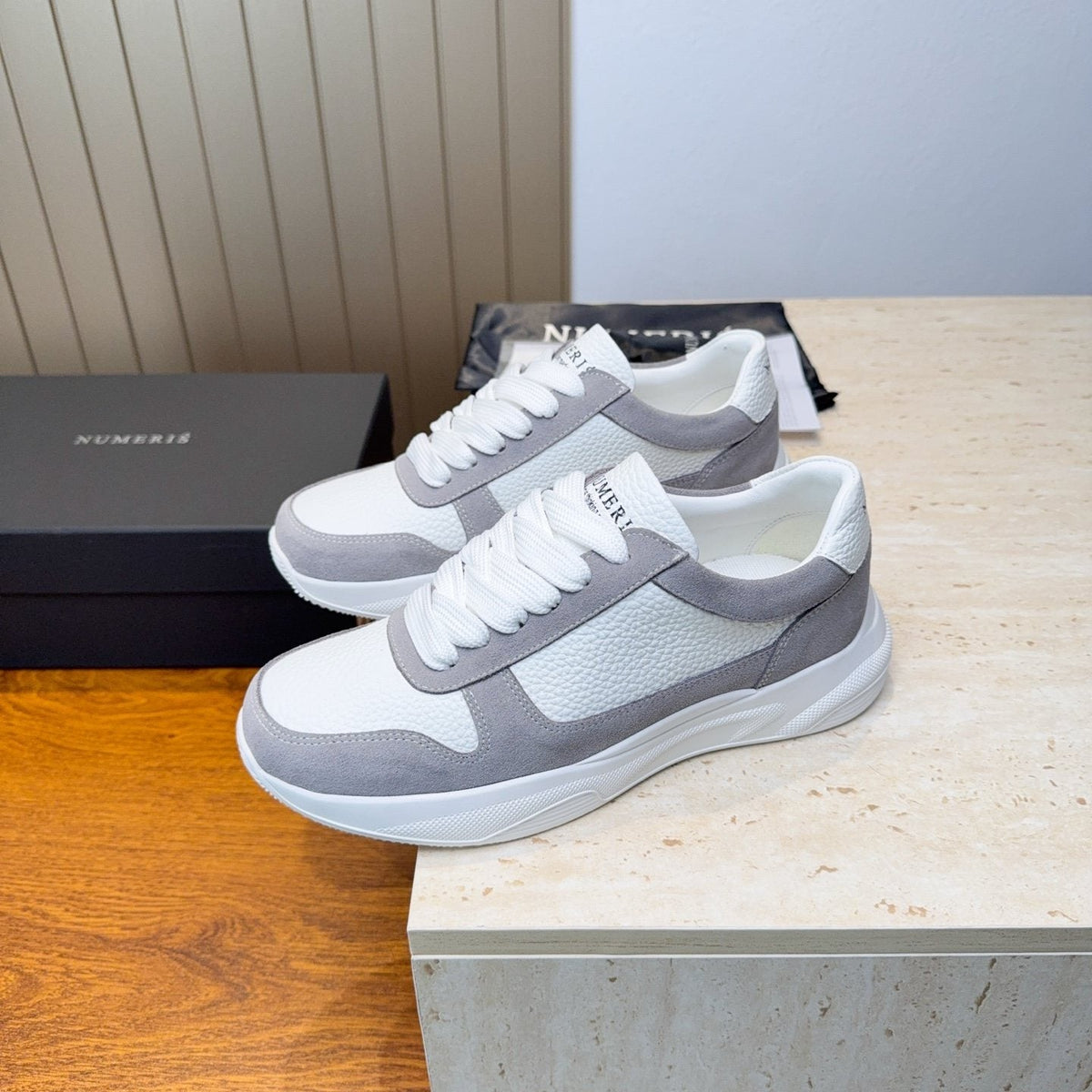 Numeris Paneled Low-Top Sneakers — front