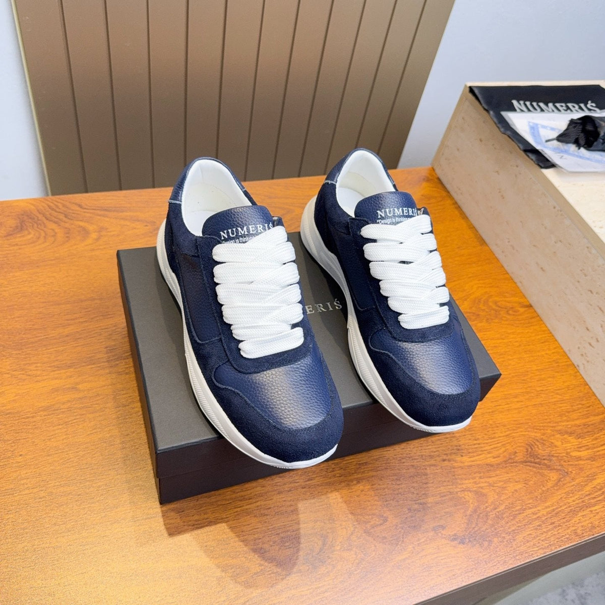 Numeris Paneled Low-Top Sneakers — front