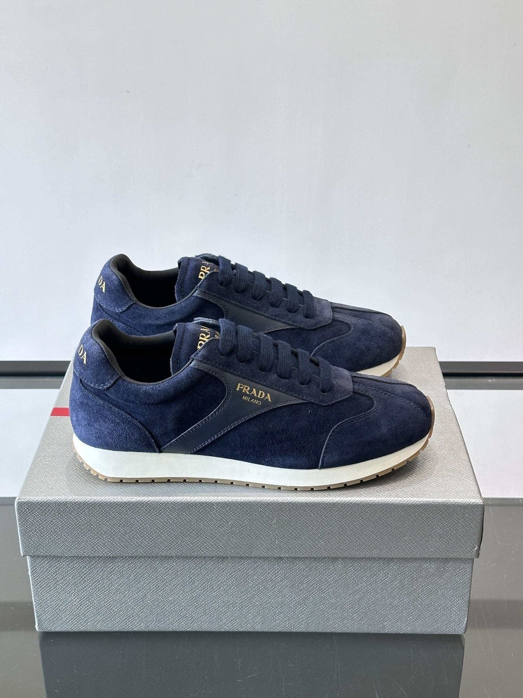 Prada Navy Triangle Badge Sneakers — front