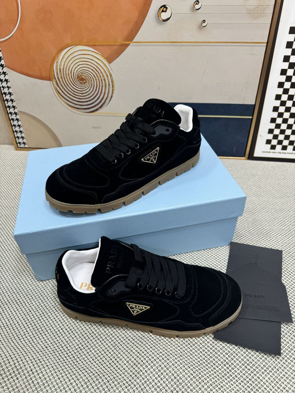Prada Triangle Logo Low-Top Sneakers — hero