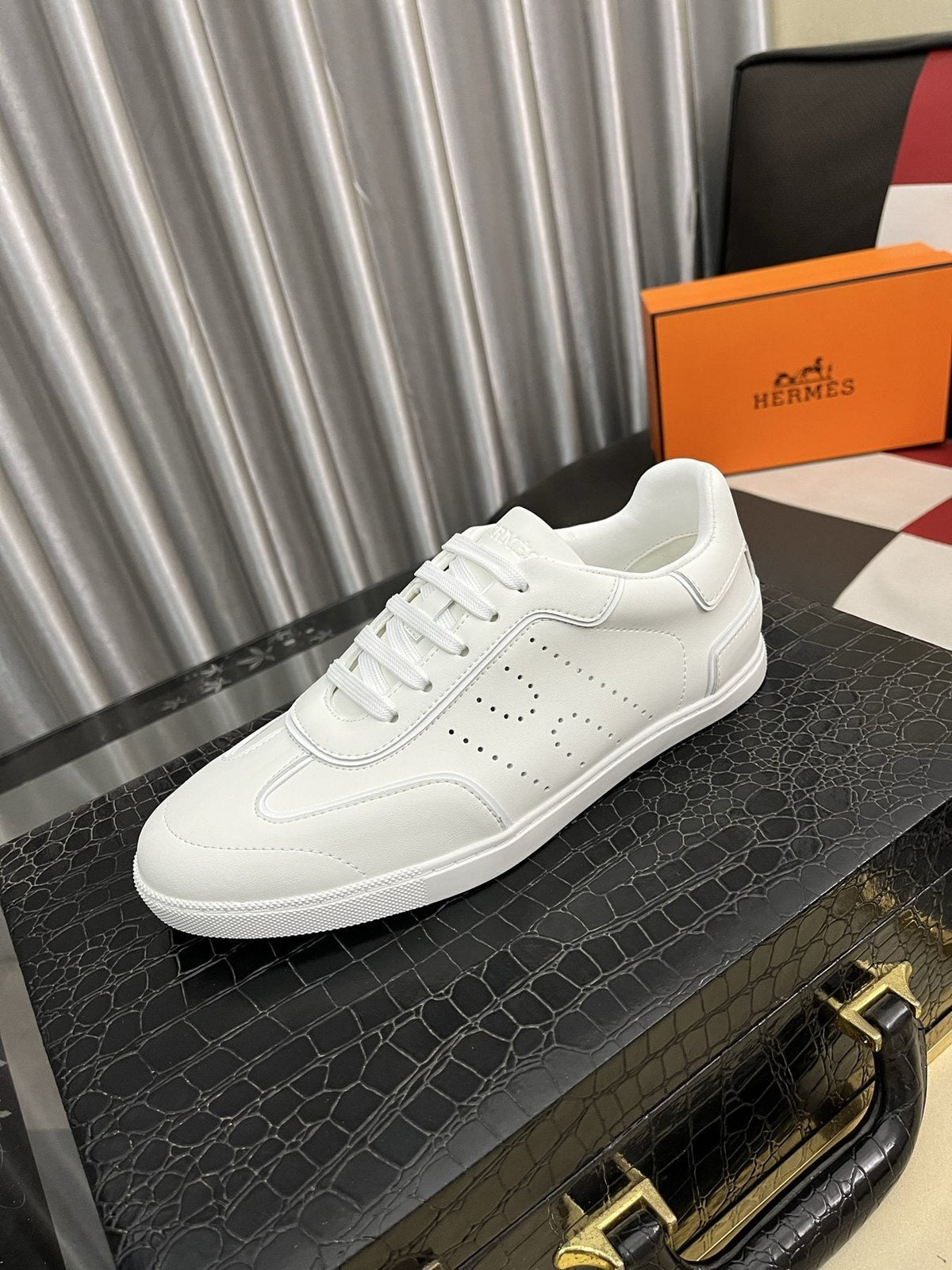 Hermès Perforated Low-Top Sneakers — front