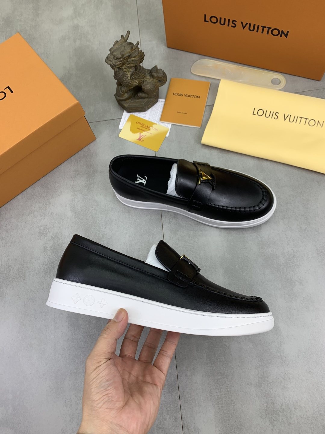 Louis Vuitton Metal Emblem Slip-On Loafers — side