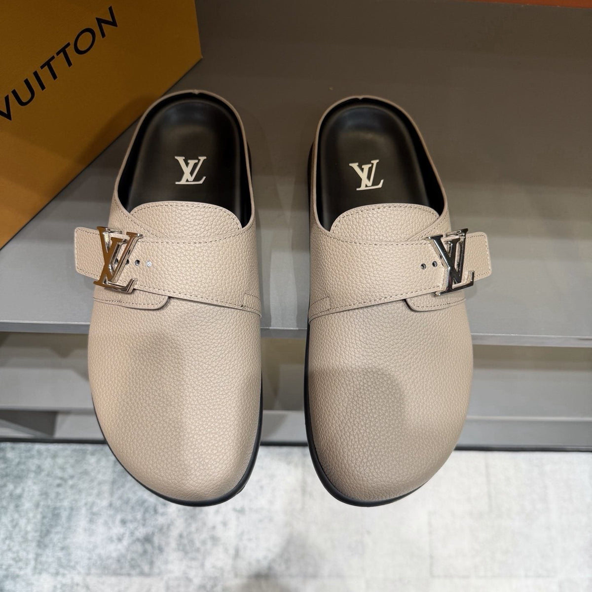 Louis Vuitton Textured Buckle Mule Sandals — front