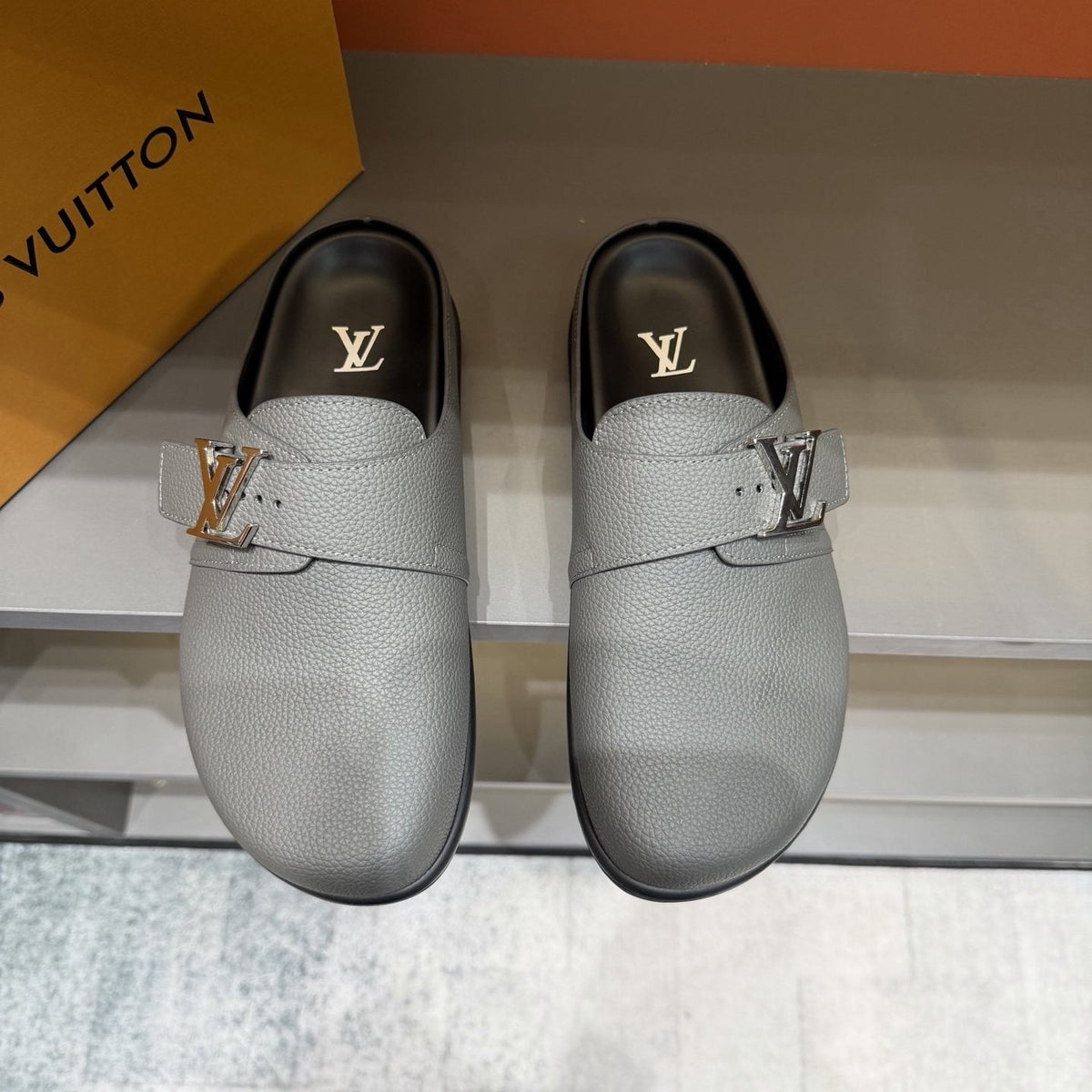 Louis Vuitton Textured Buckle Mule Sandals — front