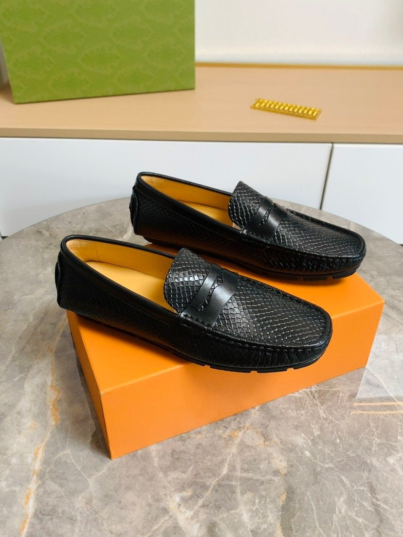 Louis Vuitton Textured Penny Loafers — front