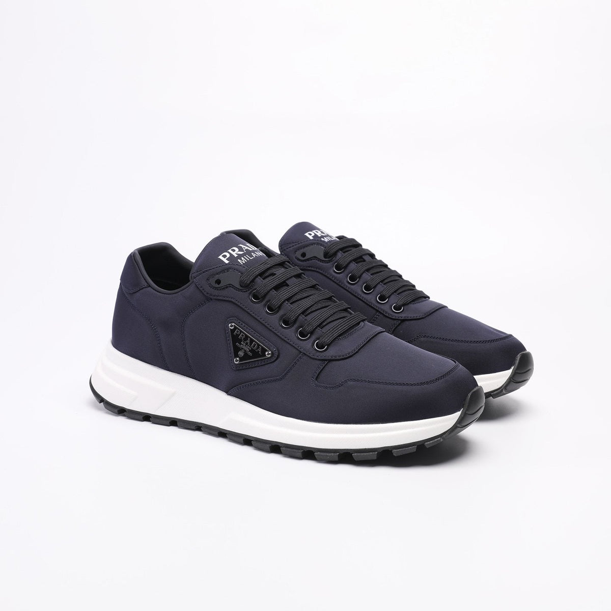 PRADA Navy Triangle Badge Sneakers — front