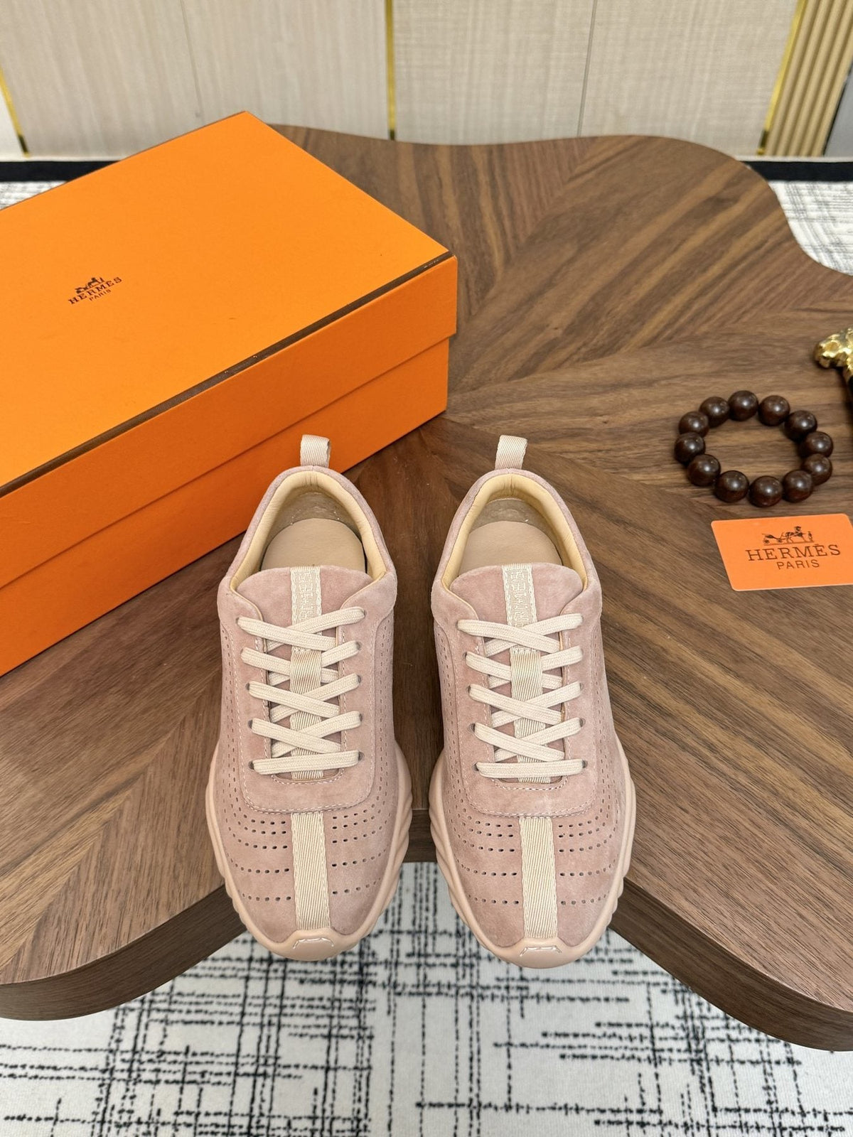 Hermès Perforated Low-Top Sneakers — front