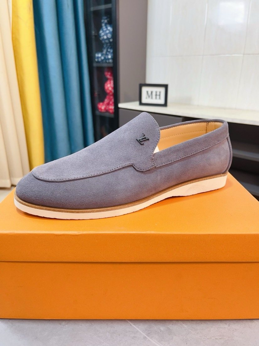 Louis Vuitton Textured Slip-On Loafers — front