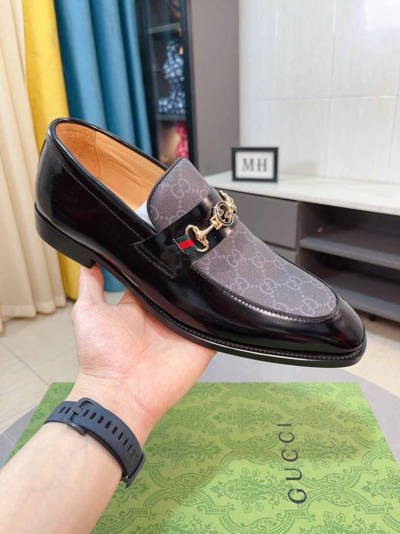 Gucci Monogram Metal Bit Loafers — model