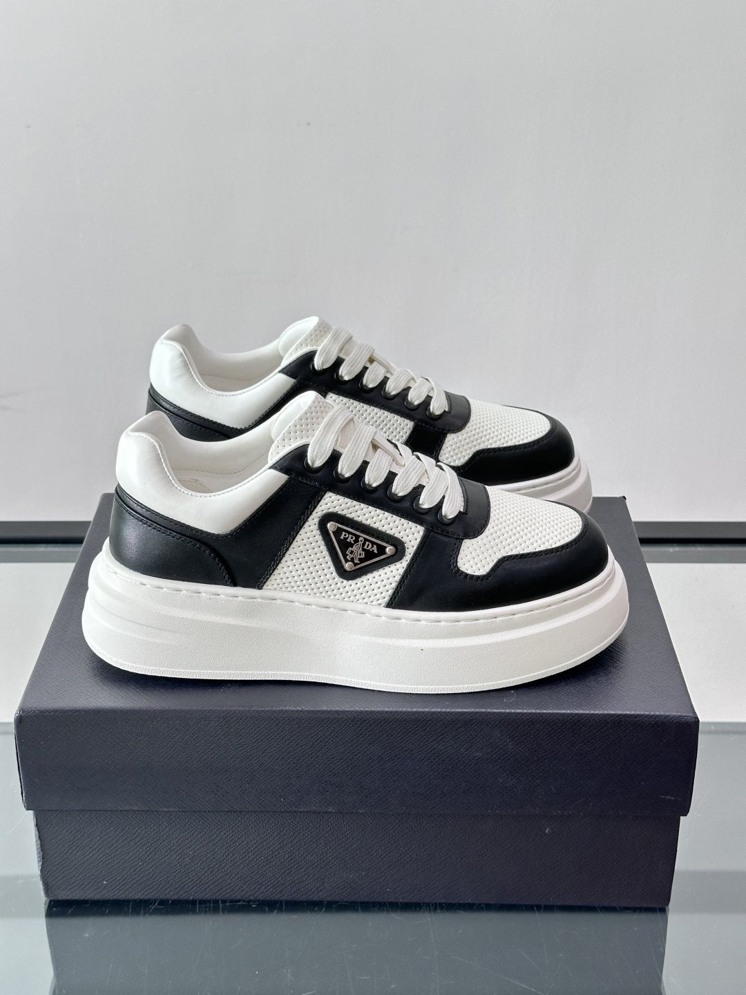 Prada Triangle Detail Low-Top Sneakers — front