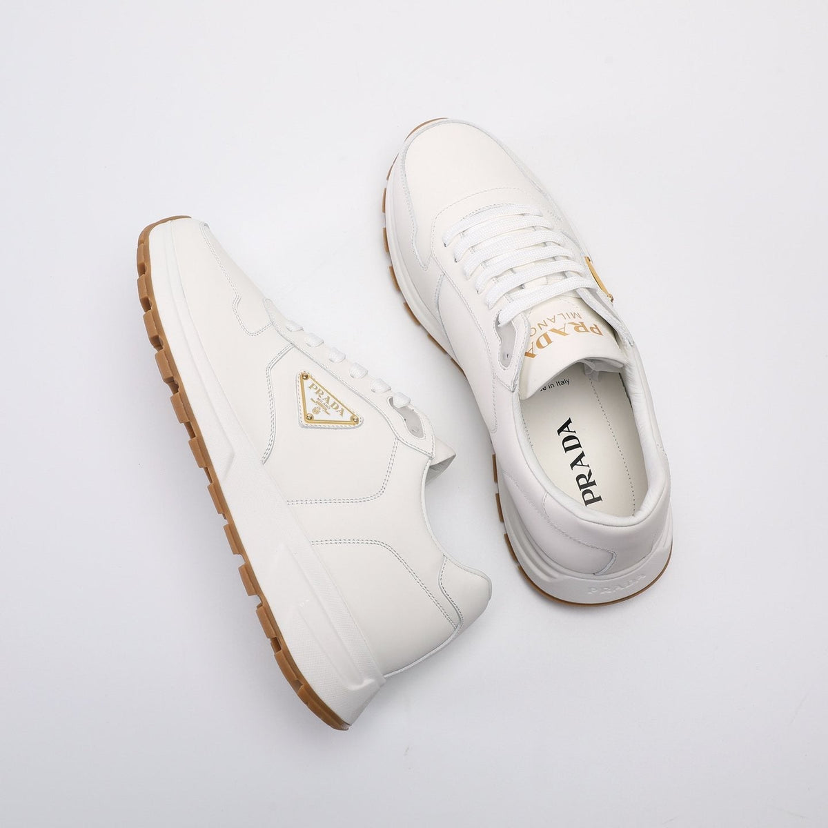 Prada Triangle Badge Low-Top Sneakers — front