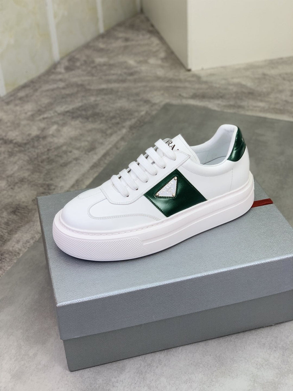Prada Triangle Panel Low-Top Sneakers — hero