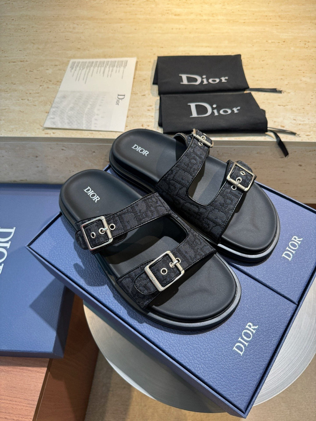Dior Aqua Buckle Slide Sandals — hero
