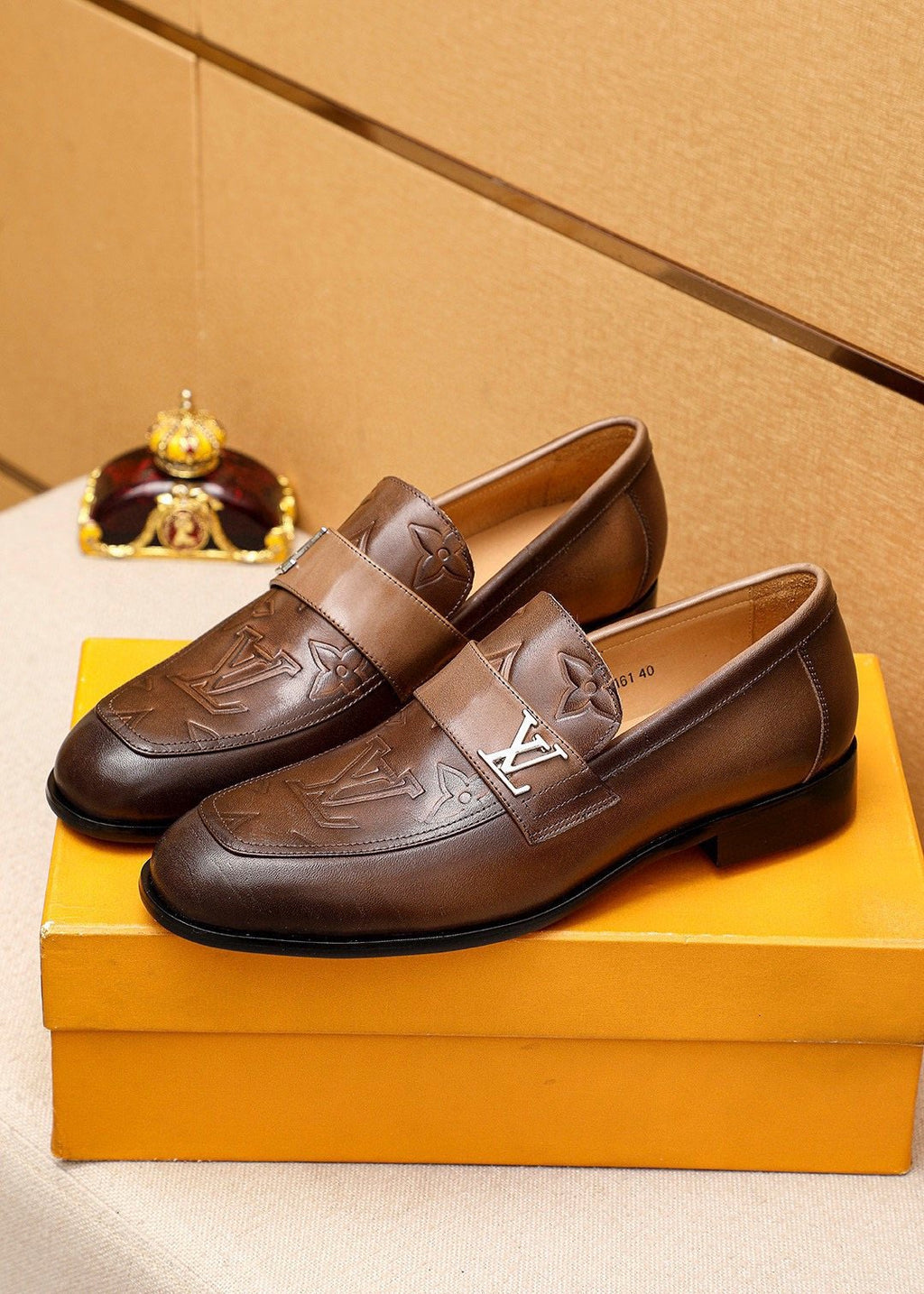 Louis Vuitton Embossed Leather Loafers — front