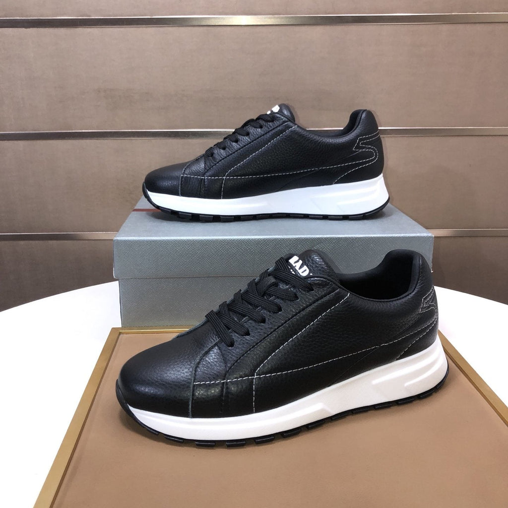 PRADA Black Quilted Low-Top Sneakers — front